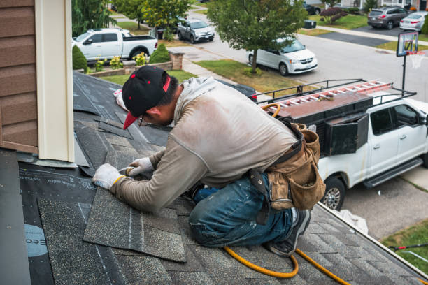 Professional Hail Damage Roof Repair technician working in Mankato, KS